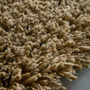 Brink & Campman Sprout Plain Rug Dusty Ground close-up picture of the pile height