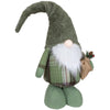 Gnome standing Gonk in green hat for Christmas
