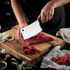 Stellar Classic 14 cm Cleaver chopping meat on a board
