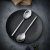 Stellar Rochester 2 Piece Serving Spoon Set serving food at the table