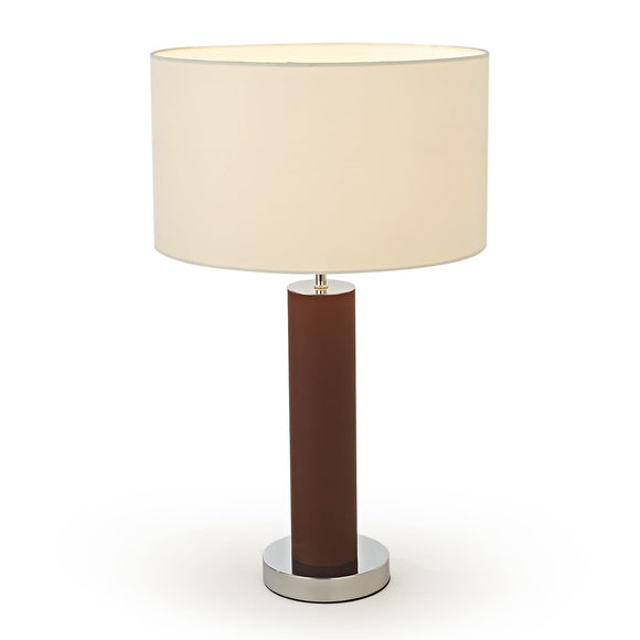 Minimalist table lamp for subtle illumination.