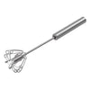 Tala 31 cm Stainless Steel Spring Action Whisk at an angle on a white background