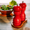 Tala Acacia Mill Rest for 2 Mills holding red salt and pepper mills