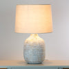 Tiana Ceramic Lamp Ridged life style picture with turned on light