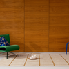 Marimekko Tiiliskivi Geometric Rug Bronze Yellow lifestyle picture in the living room