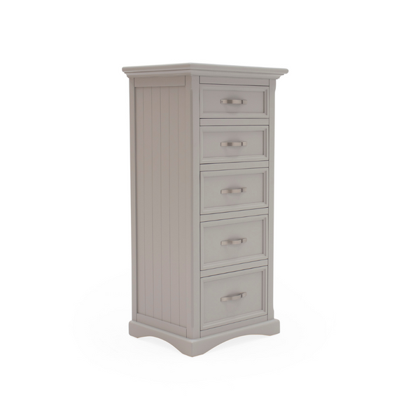 Pavilion grey chest of drawers with decorative paneling.