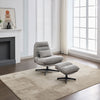 Turner Swivel Accent Chair Grey life style side view photo with footstool