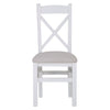Elegant and cozy: the white cross-back chair for style and comfort.