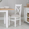 Transform your space with this stylish white dining chair.
