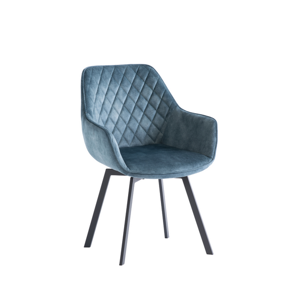 Set of two teal upholstered dining chairs for a stylish dining room.
