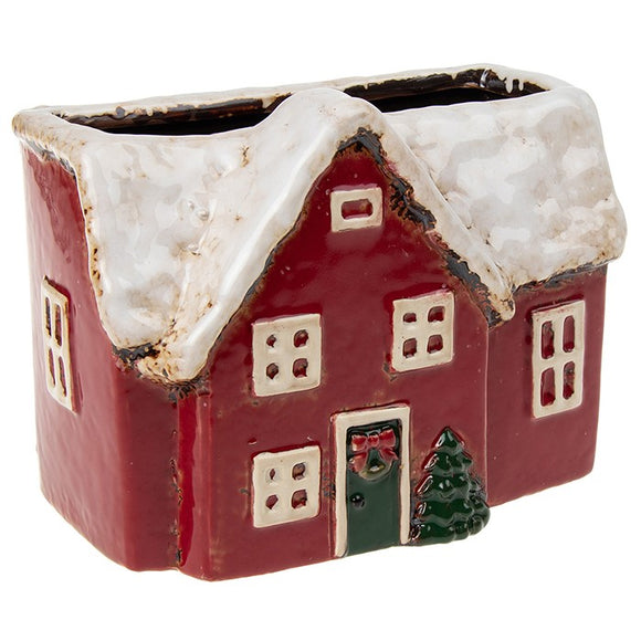 Elevate your holiday decor with the Village Pottery Christmas Cottage Planter. Add a touch of festive charm to your space with this delightful planter, designed in the shape of a cozy cottage. 