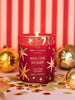 Winter Berry Medium Scented Candle styled in a festive room setting