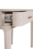 Cream-colored dressing table desk with elegant design.