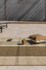 Brink & Campman Zona Block Stripe Outdoor Rug Cashew lifestyle picture outside