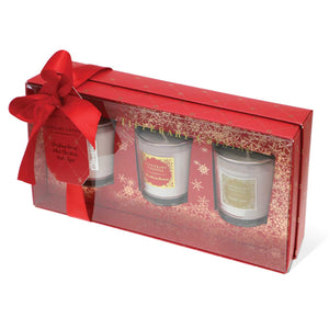 Add a festive touch to your holiday decor with the Tipperary Crystal Set of Mini Christmas Candles in a charming Red Box.