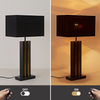 Functional lamp for bedside or desk use.