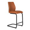 Modern tan cantilever frame counter stool.