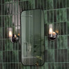 Polished chrome bathroom wall lights enhancing bathroom aesthetics