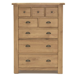 Timeless bedroom storage with our oak tall chest of drawers.