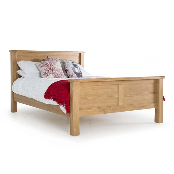 Regal wooden king size bed for bedroom luxury.