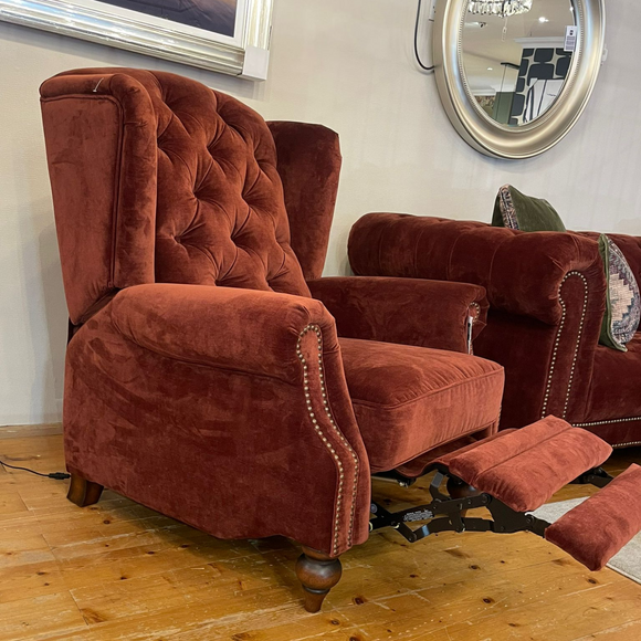 Elegant recliner armchair with classic Chesterfield design