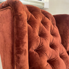 Timeless recliner armchair with luxurious buttoned upholstery