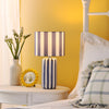 Cicada Table Lamp Blue Ceramic and Polished Chrome life style picture with turned on light