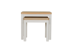 Modern nest of side tables in soft neutral tones