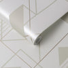 "Graphical wallpaper for walls featuring soft gold and taupe hues."
