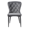 Plush upholstered chair with winged back