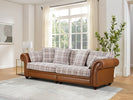 Luxurious 4 seater sofa in leather and fabric.
