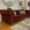 Fabric chesterfield sofa with timeless hand-tied buttoning