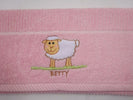 Absorbent towel for dishes with a sheep pattern.
