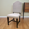 Experience comfort with this upholstered dining chair.