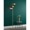 Satin gold standing light with contemporary design
