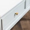 Monroe Furniture’s elegant marble top adds sophistication.
