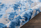 Blue grey abstract wool rug that adds a chic modern touch to any room.
