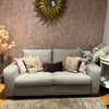 Stylish 2.5 seater sofa with reversible fibre filled back cushions