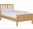 Natural oak single bed frame for bedrooms.
