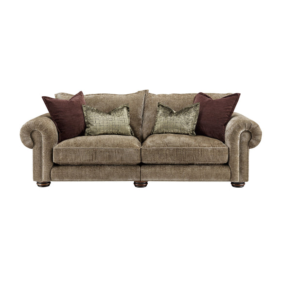 3 seater sofa with elegant scrolled arms in a cozy living room setting