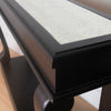 Black wood console table with antique mirrored surface