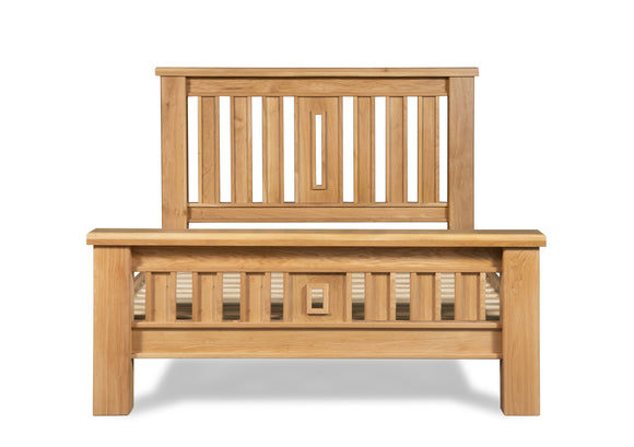 Wooden double bed frame in natural oak finish
