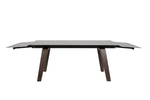 Explore the beauty of an extendable dining table with soft-touch extension