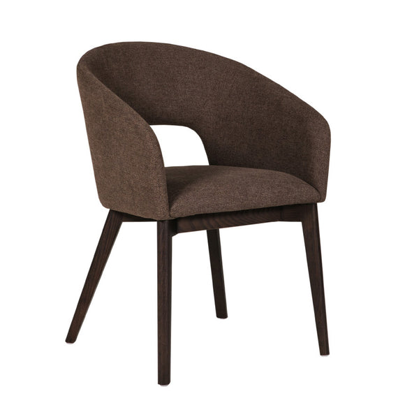 Modern dining chair with rich textured fabric.