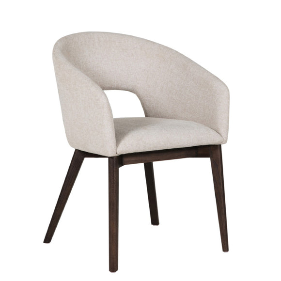 Modern dining chair with natural tones and rich textured fabric.