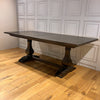 Elevate your dining experience with this traditional table.