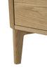 Keep your essentials within reach with this bed side table