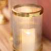 Veda Hurricane gold candle holder for modern home decor