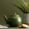 lifestyle image of olive green teapot 