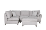 Corner sofa with seating expansion via ottoman